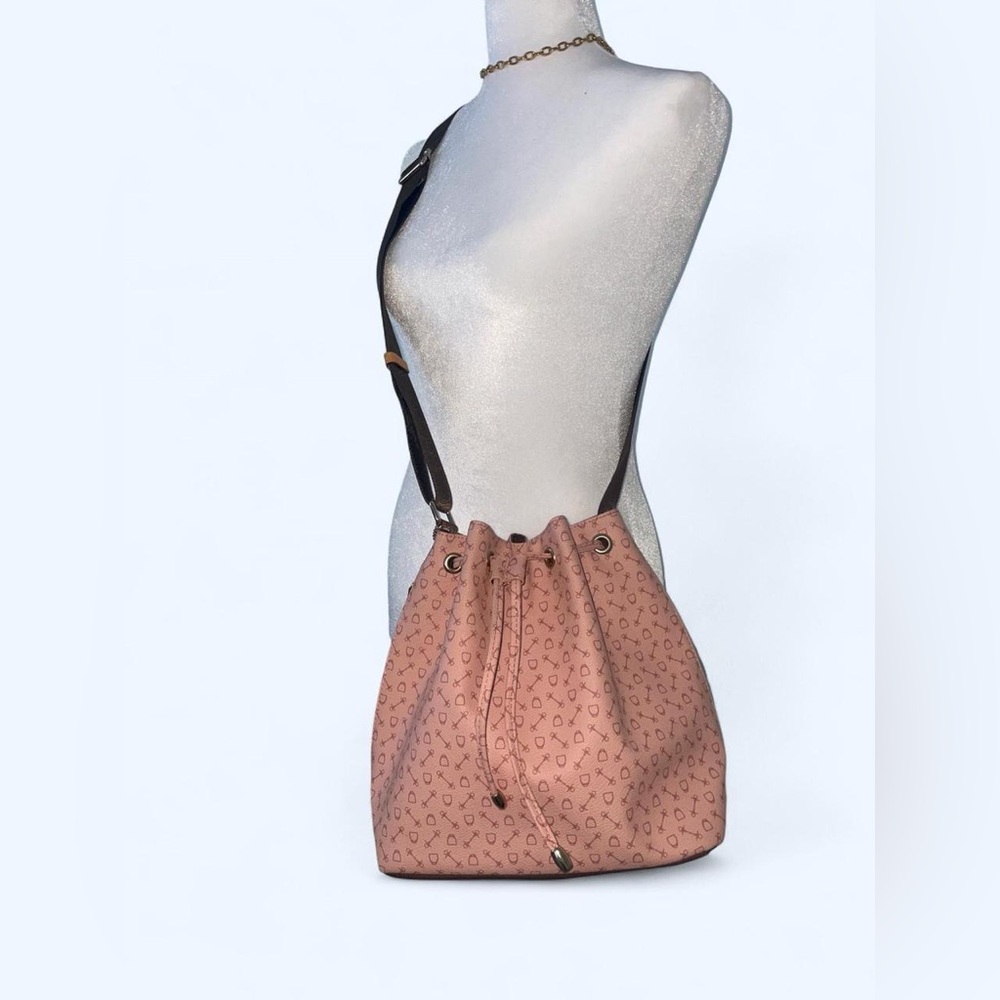 Pink leather drawstring bucket bag with gold hardware by WHY HarnessGlobal